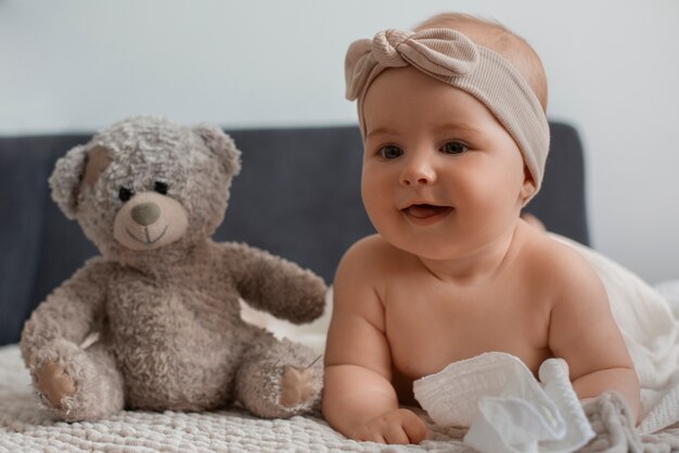 Cute baby with stuffed toy