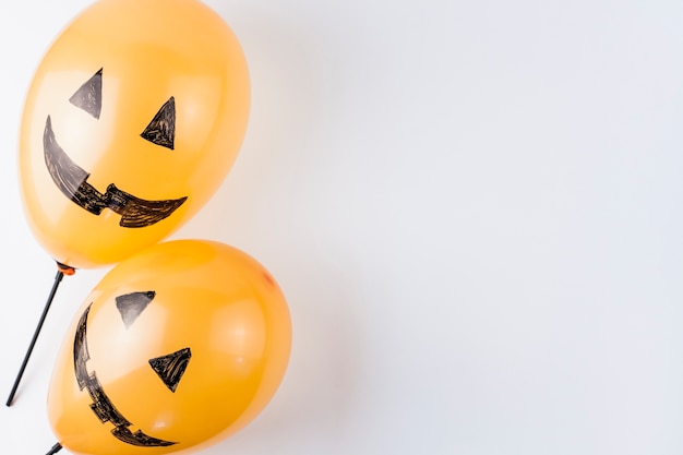 Cute balloons decorated as pumpkins 