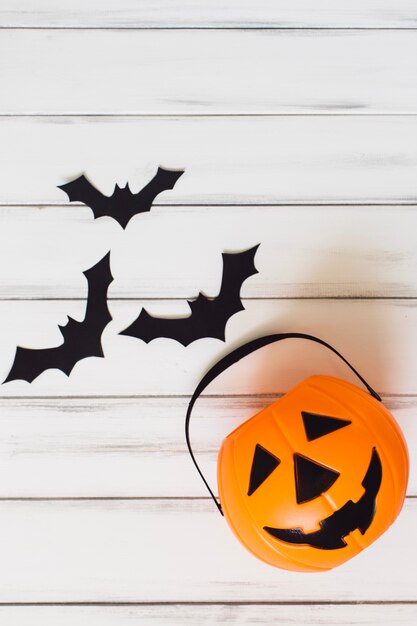 Cute basket and bats for Halloween celebration