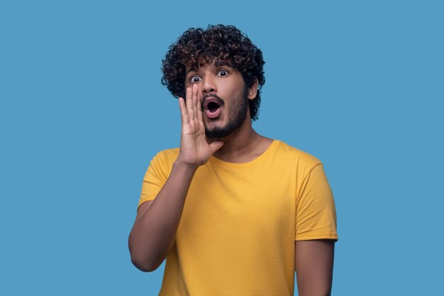 Cute bearded mustached guy trying to call attention to himself