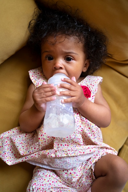 Cute black baby at home