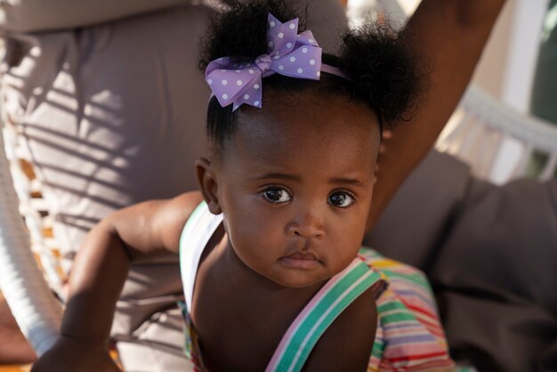 Cute black baby portrait at home