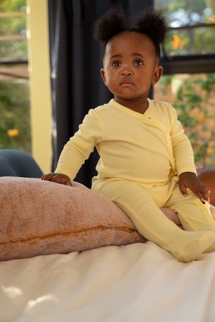 Cute black baby portrait at home