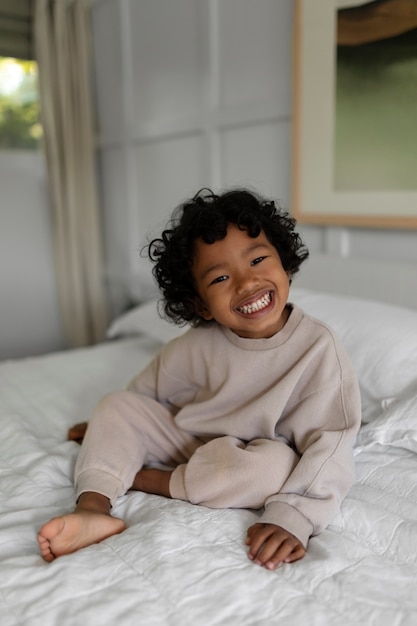 Free photo cute black toddler smiling