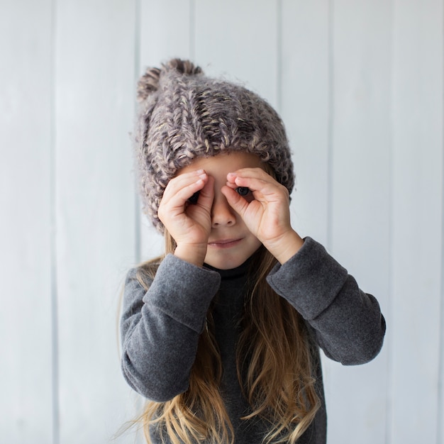 Cute blonde girl making funny faces