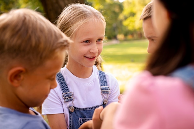 Cute blonde girl talking with friends