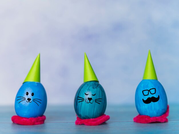 Cute blue eggs with hats