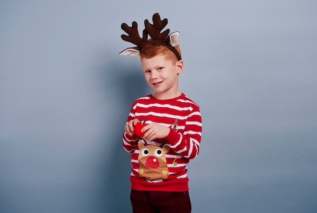 Cute boy looks like reindeer