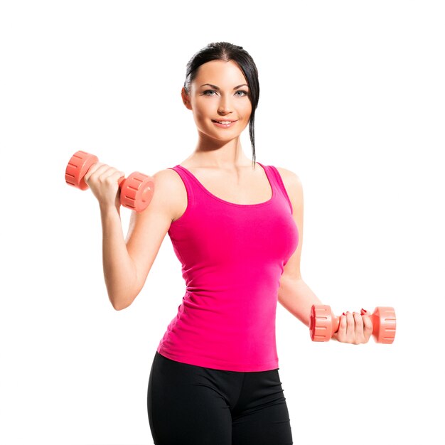 Cute brunette woman during fitness exercise