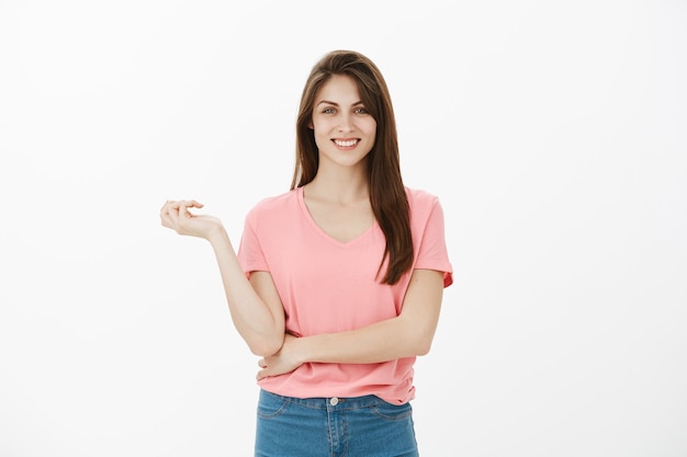 Cute brunette woman posing in the studio