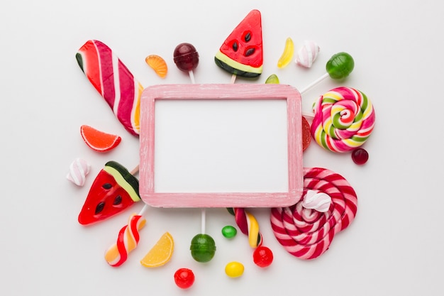 Cute candies frame with copy space