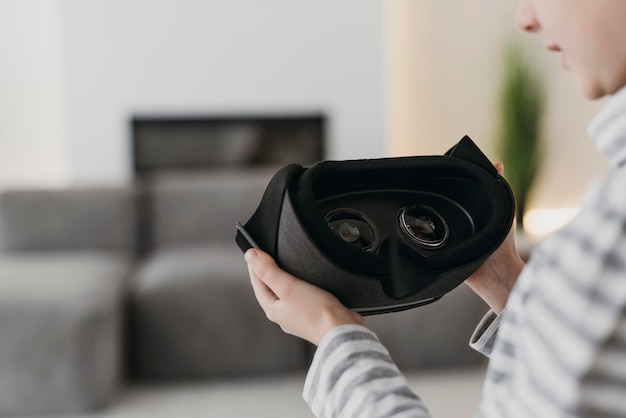 Cute child using virtual reality headset blurred background