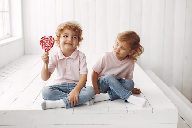 Cute children having fun with candy