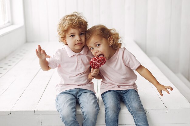 Cute children having fun with candy