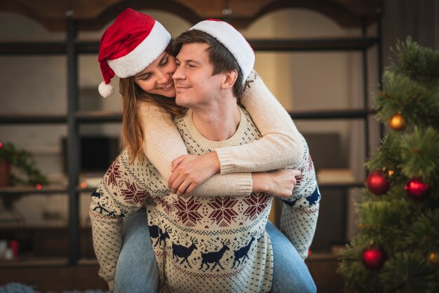 Cute christmas couple being playful