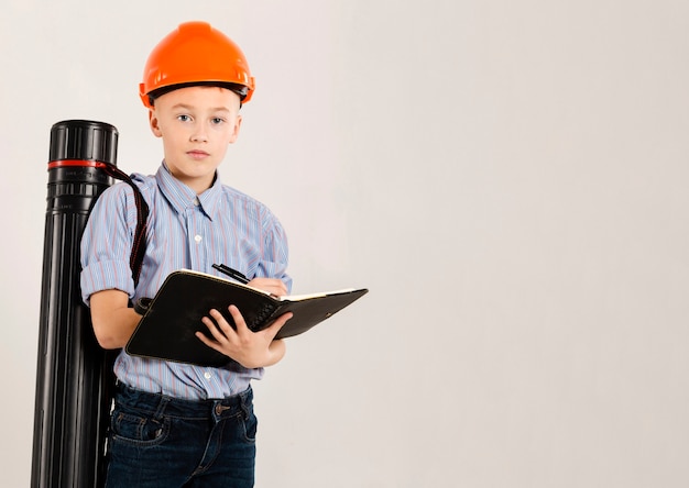 cute construction worker holding notebook