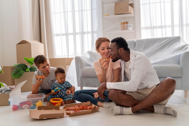 Cute couple getting ready to move with their children