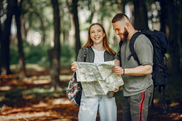 Cute couple have a rest in a forest