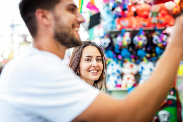 Cute couple having fun at fair.