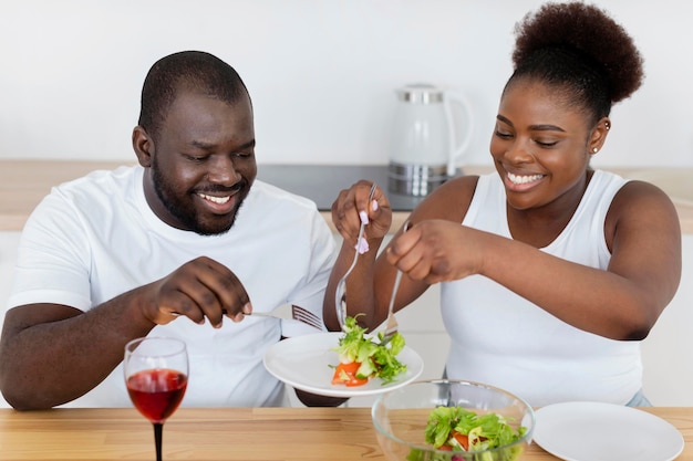 Free photo cute couple having a romantic dinner