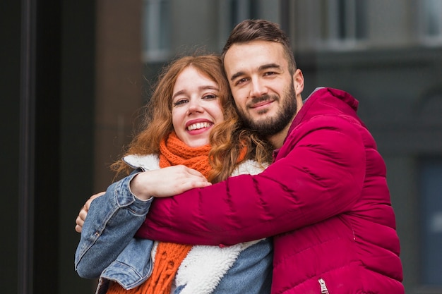 Free photo cute couple hugging each other