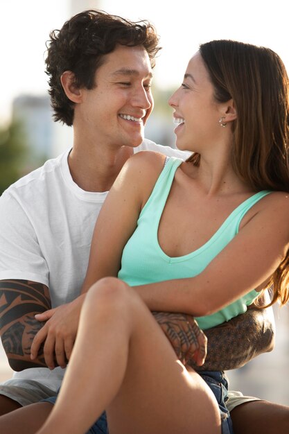 Cute couple hugging while traveling in a city