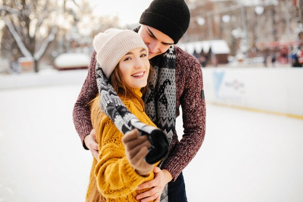 Cute couple in a ice arena