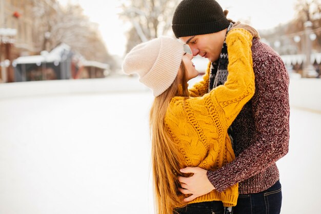 Cute couple in a ice arena