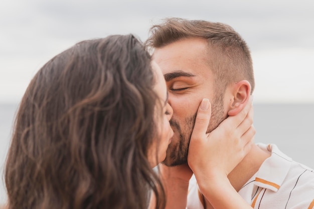 Free photo cute couple kissing