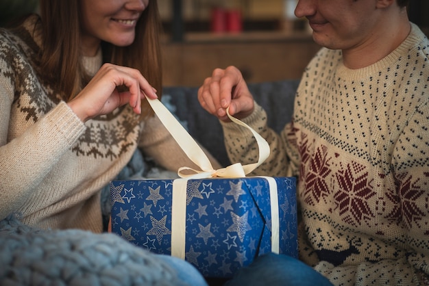 Cute couple opening present