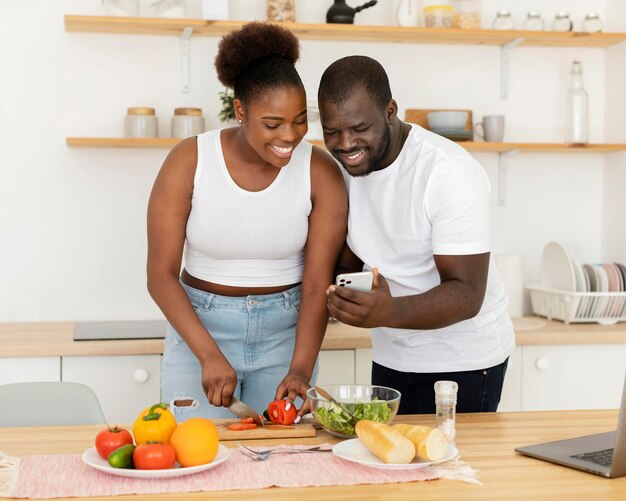 Cute couple staying in the kitchen