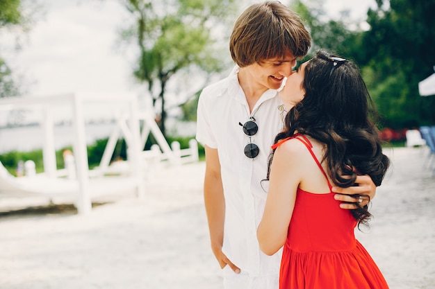 Free photo cute couple in a summer park