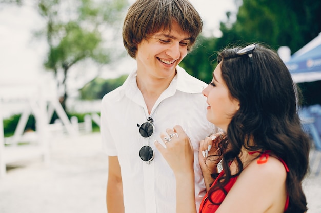 Free photo cute couple in a summer park