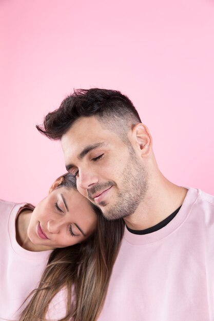 Cute couple with closed eyes