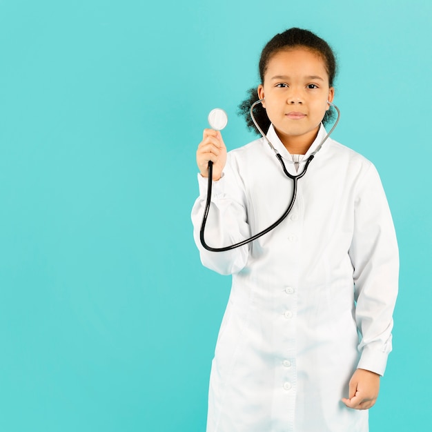 Cute doctor holding stethoscope