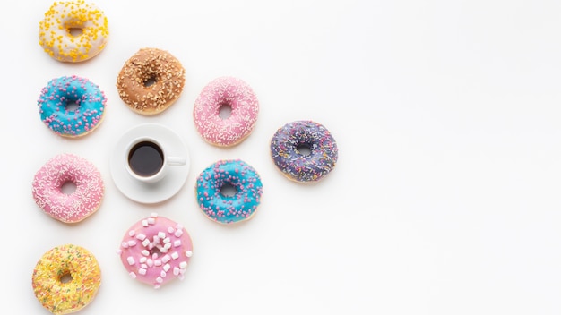 Free photo cute donuts arrangement with copy space