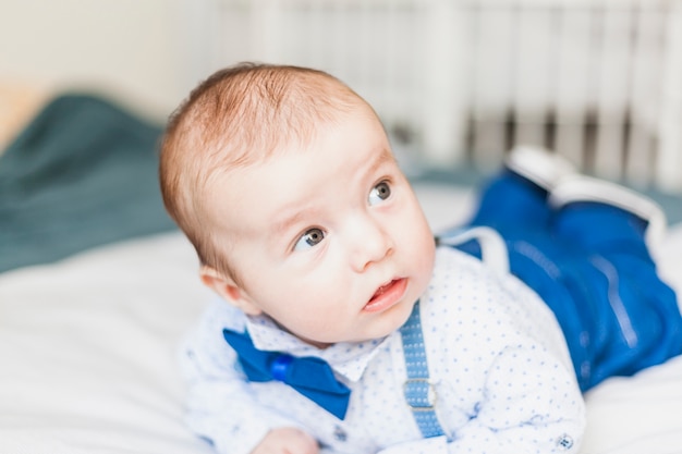 Cute and elegant baby wearing bow tie