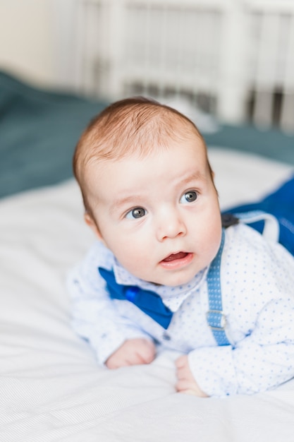 Cute and elegant baby wearing bow tie