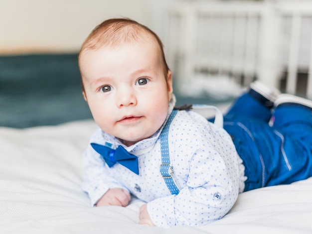 Cute and elegant baby wearing bow tie