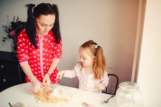 Cute family have fun in a kitchen