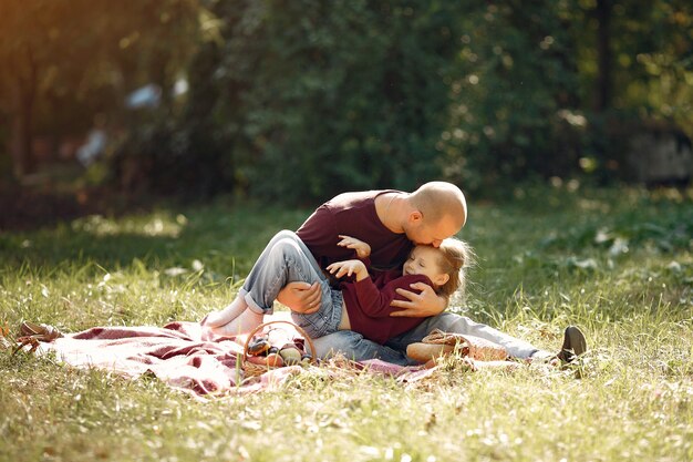 Cute family playing in a autumn park