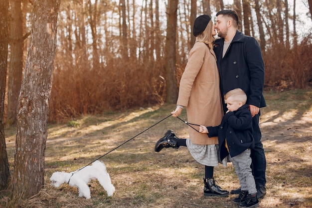 Free photo cute family playing in a park