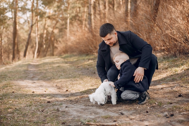 Free photo cute family playing in a park