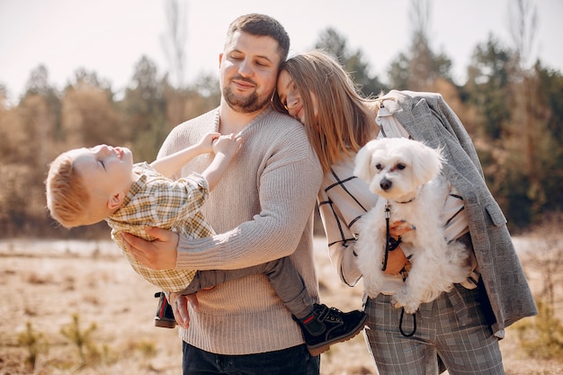 Free photo cute family playing in a park