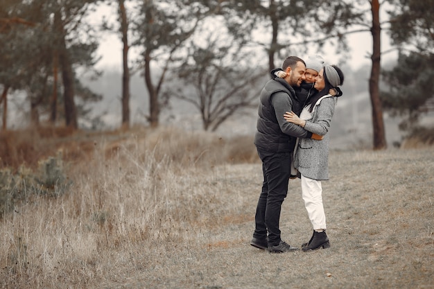 Free photo cute family playing in a spring forest