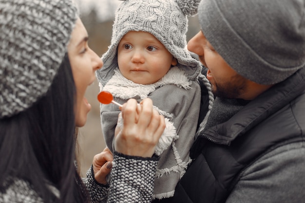 Cute family playing in a spring forest