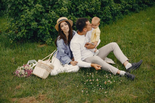 Cute family playing in a summer field