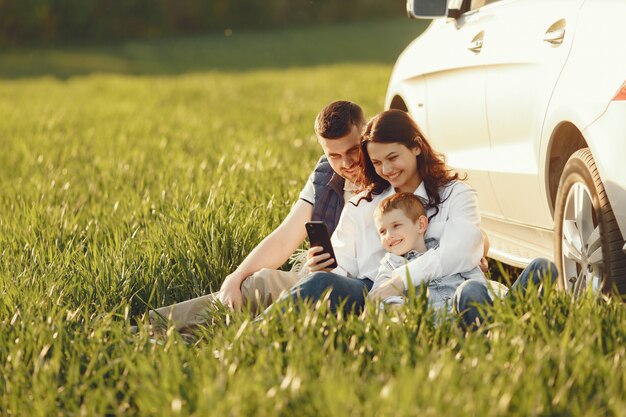 Cute family playing in a summer field