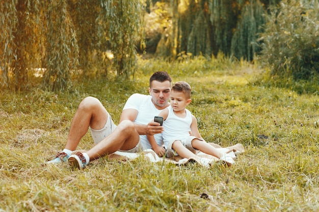 Cute family playing in a summer field