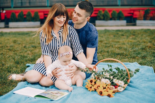 Cute family playing in a summer park